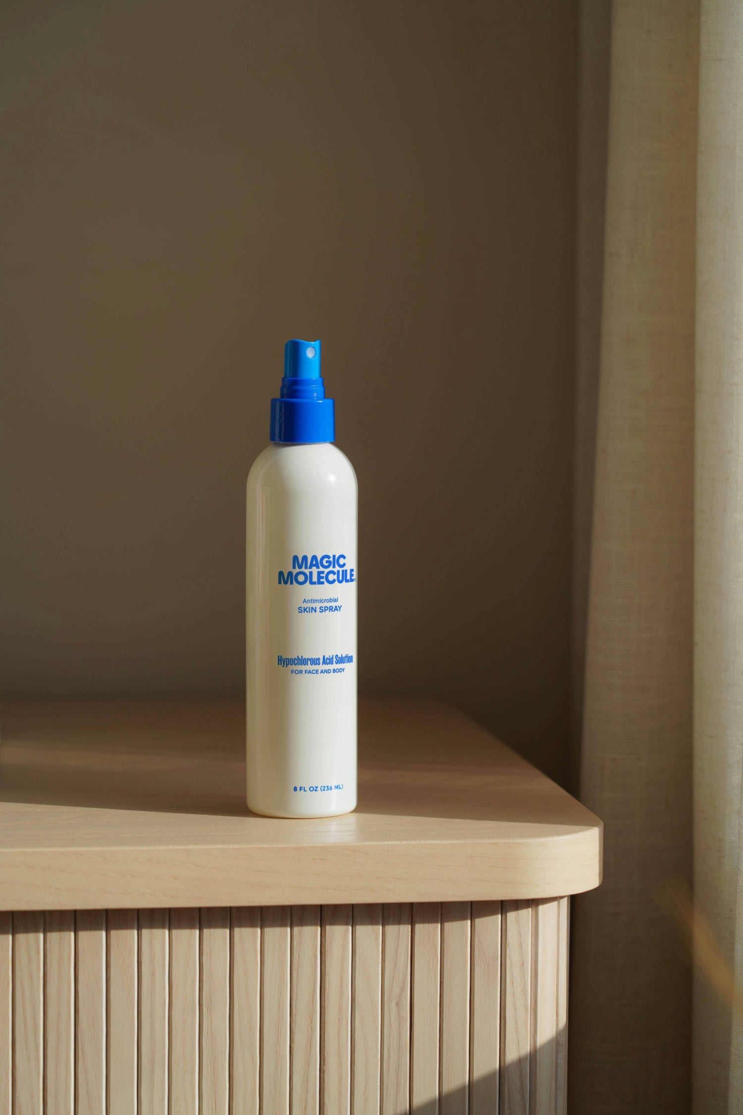 8oz skin spray bottle on countertop 
